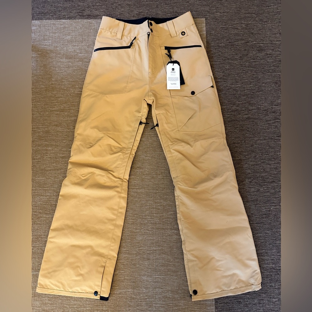 Imperial Motion (IM) brand snowboard pants in size S. Never worn with tags.